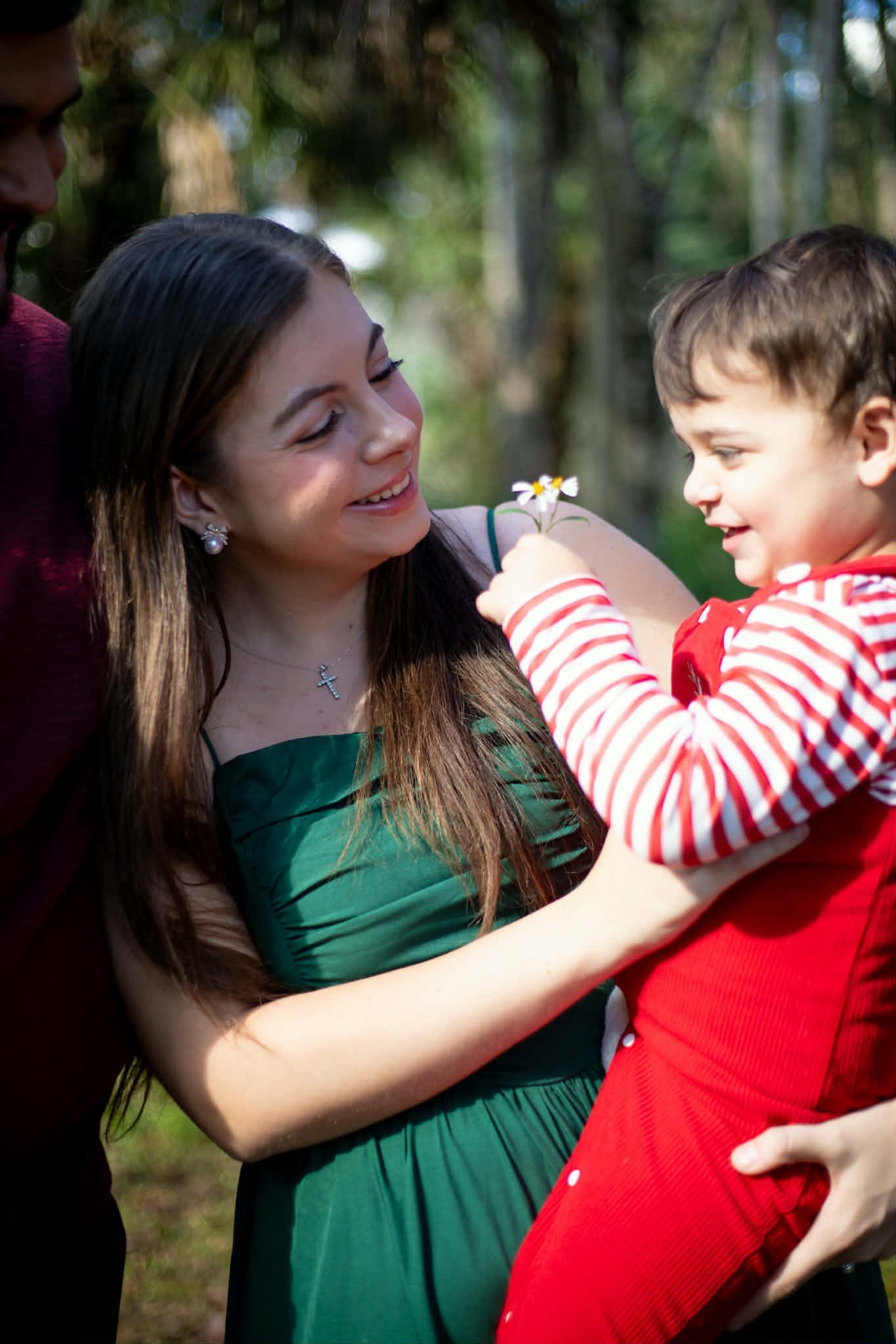 Abbey enjoying a little moment with her child outdoors